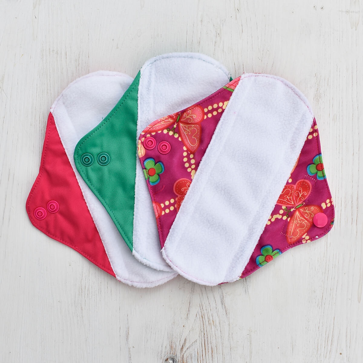 https://www.peacewiththewild.co.uk/wp-content/uploads/2019/08/small-reusable-sanitary-pads-3-pack-butterfly.jpg